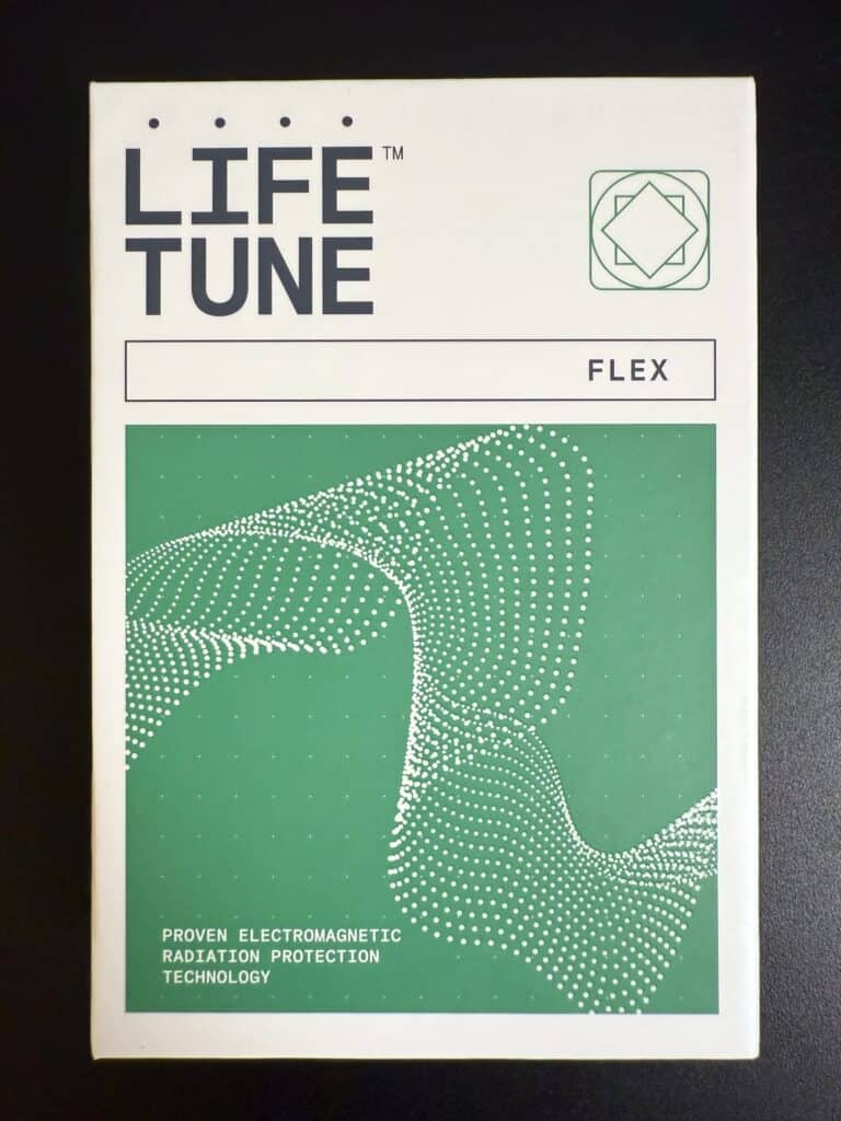 A box labeled LIFE TUNE FLEX displaying a green abstract pattern with text claiming Proven Electromagnetic Radiation Protection Technology.