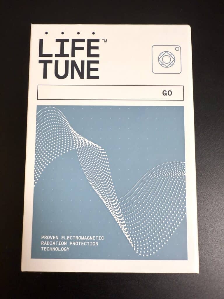 A box labeled LIFE TUNE GO with a digital wave design. Text reads Proven Electromagnetic Radiation Protection Technology.