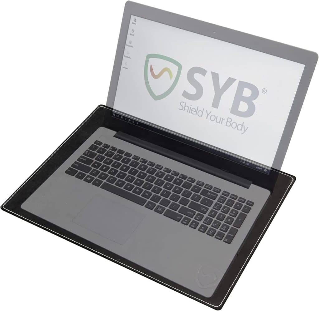 Laptop displaying a screen with the SYB logo, placed on a protective lap desk.