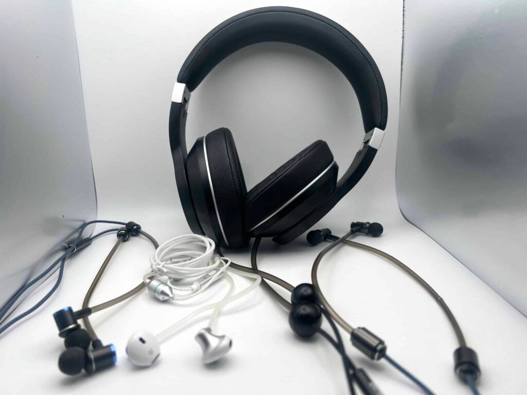 Multiple pairs of airtube headphones on a white background. The image was taken during EMF Academy's review and testing of Airtube headphones.