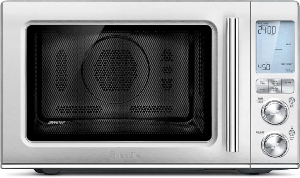 A stainless steel microwave oven with a digital display, control knobs, and a push-button door.