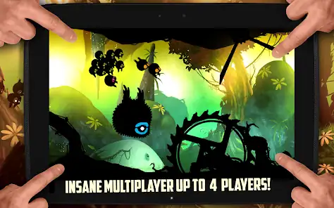 Four hands play a colorful side-scrolling game on a tablet, featuring dark creatures and obstacles, with the text “Insane multiplayer up to 4 players!” at the bottom.