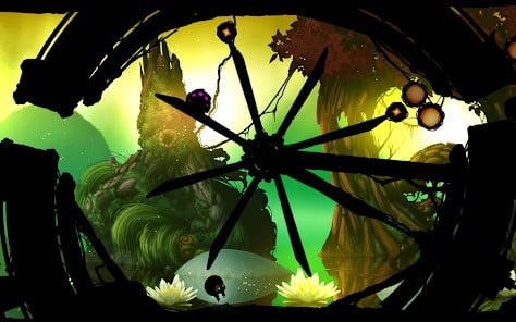 Silhouetted characters navigate through a dark, gear-like structure against a vibrant, forested background with green and yellow hues.