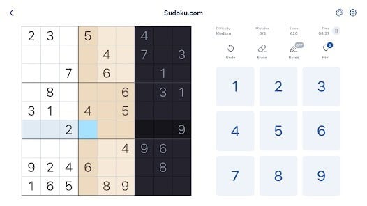 A partially completed digital Sudoku puzzle with some cells shaded in different colors and a number pad on the right side of the screen.